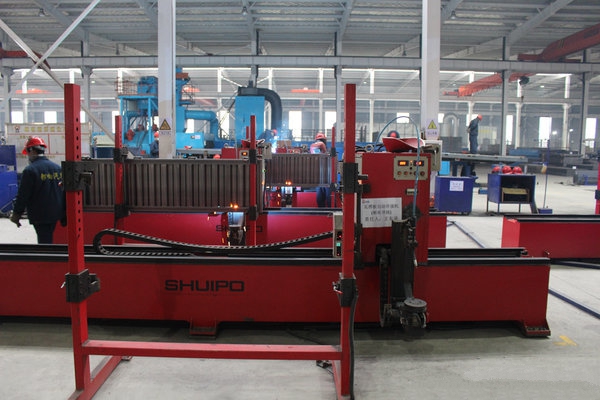 瓦楞板自动焊接机在挂车机器人生产线中的应用